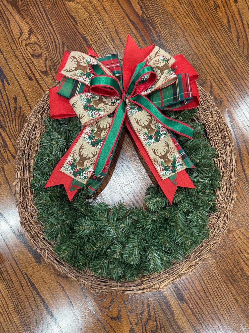 Festive Green Holiday Wreath with Red & Green Reindeer Bow